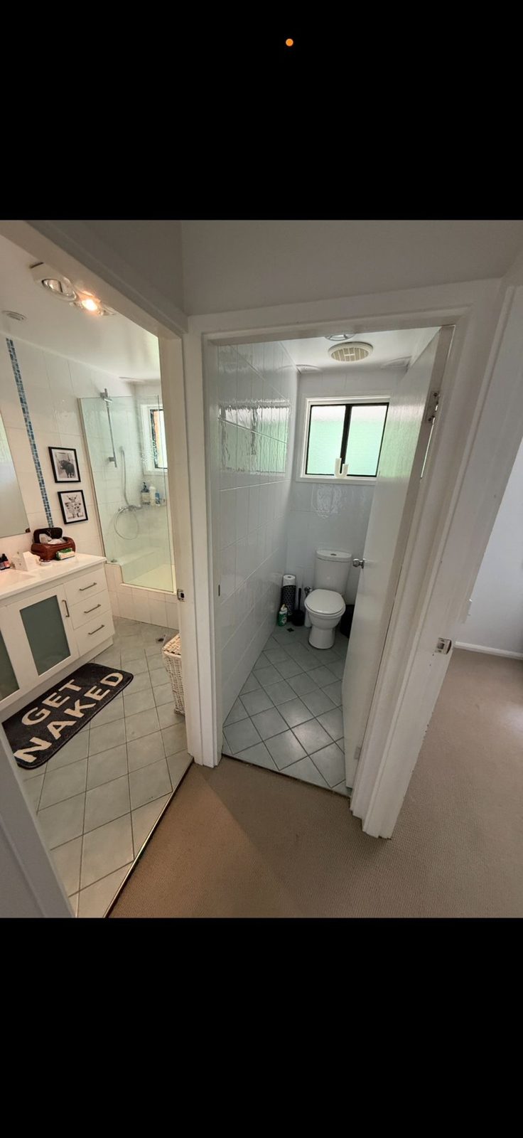 Bathroom doorway during asbestos removal works